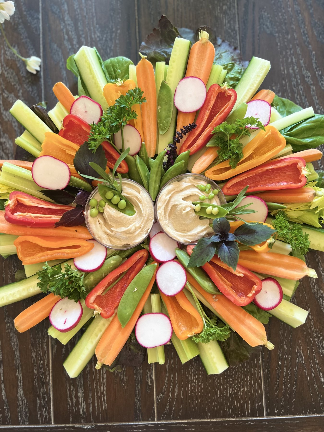 Crudité garden board with fresh vegetables and dips