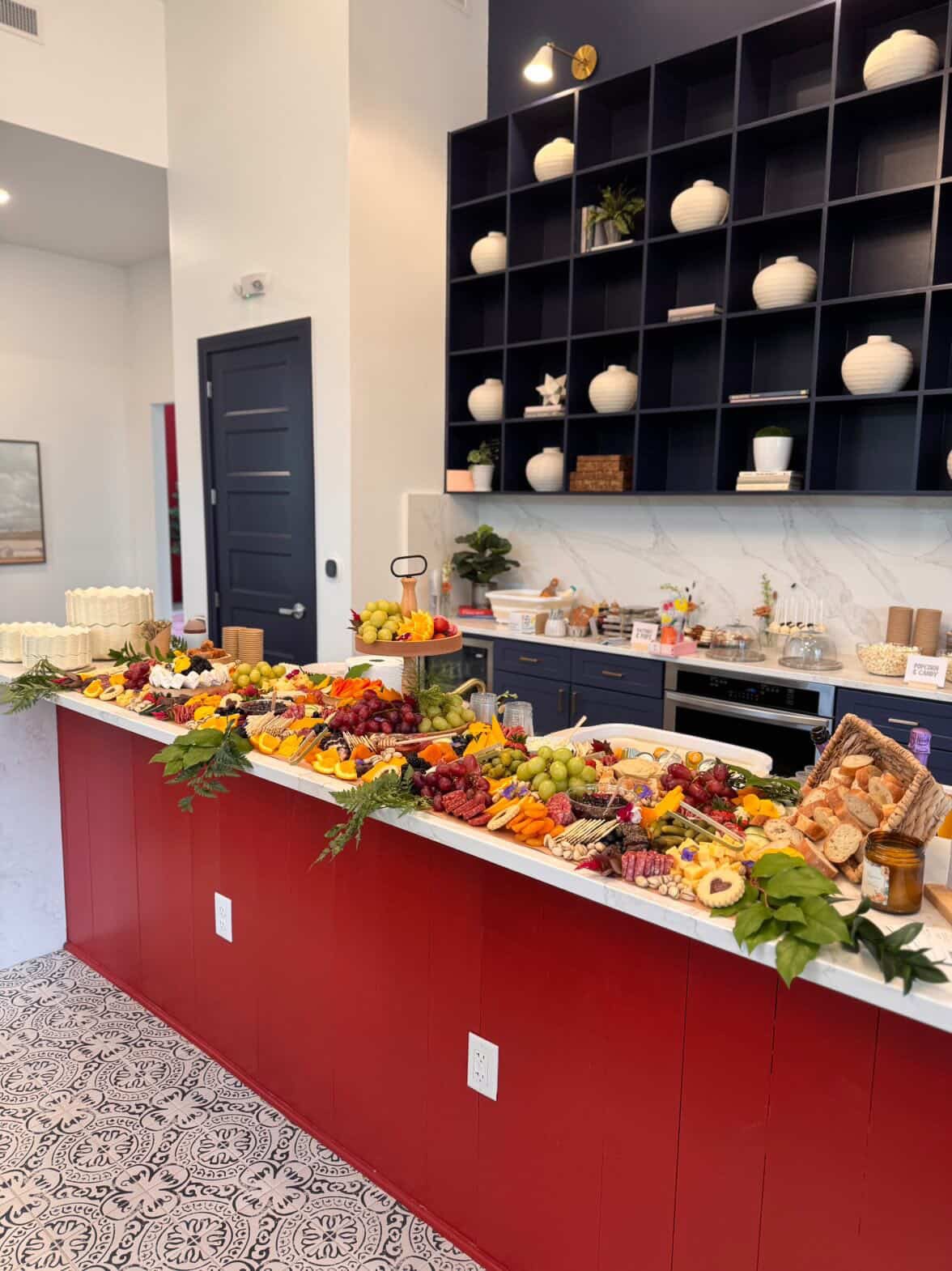 Custom grazing table spread with charcuterie and accompaniments